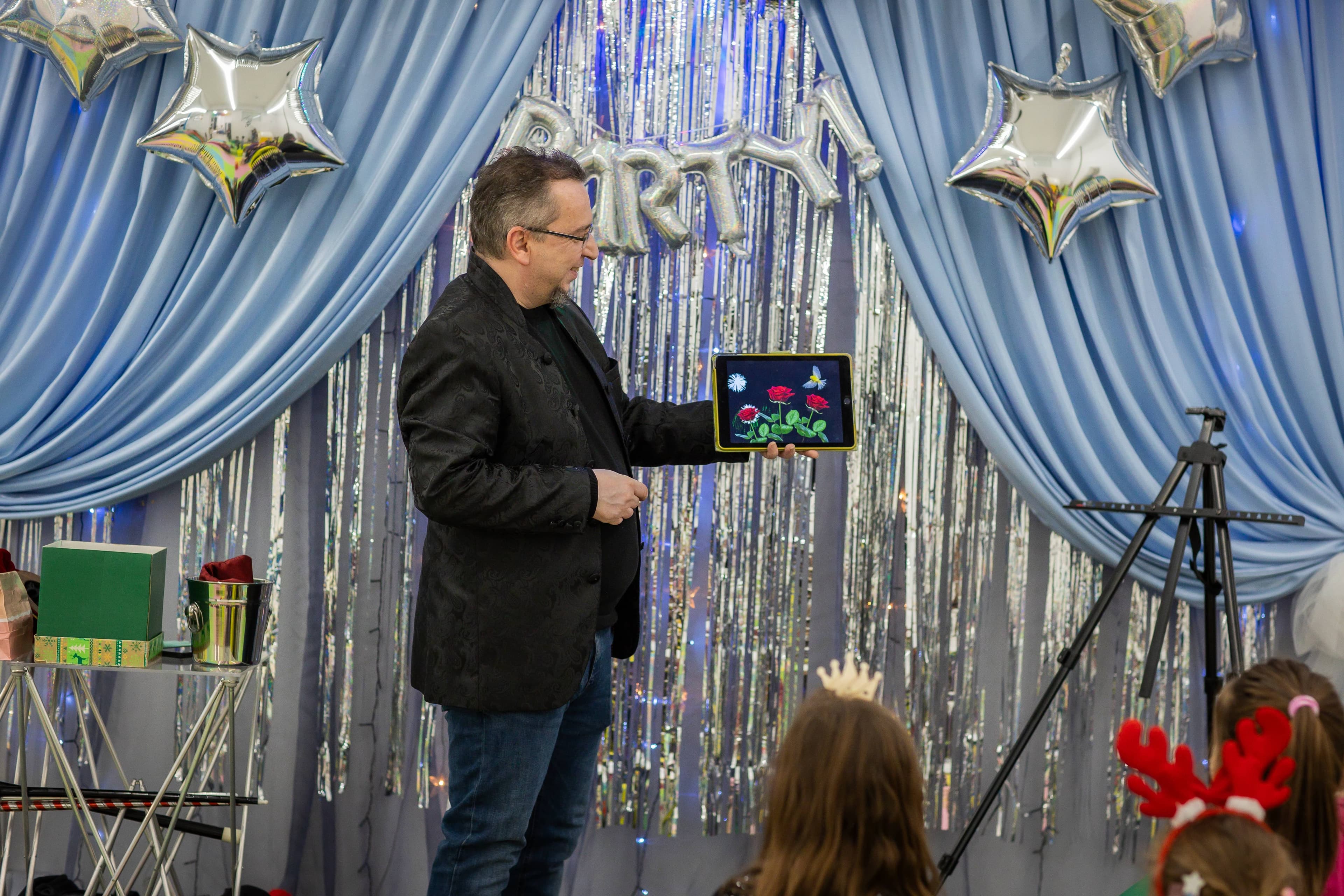 Children enjoying magic show